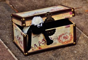 Toy sheep in a treasure box